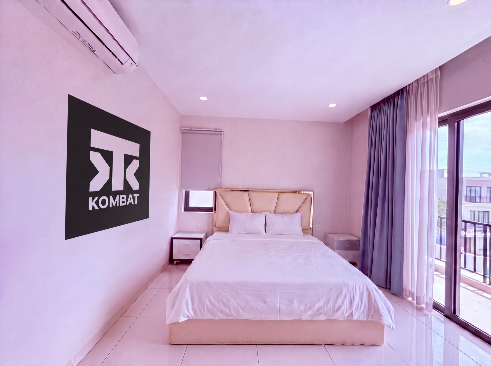 An afternoon room with the balcony doors open